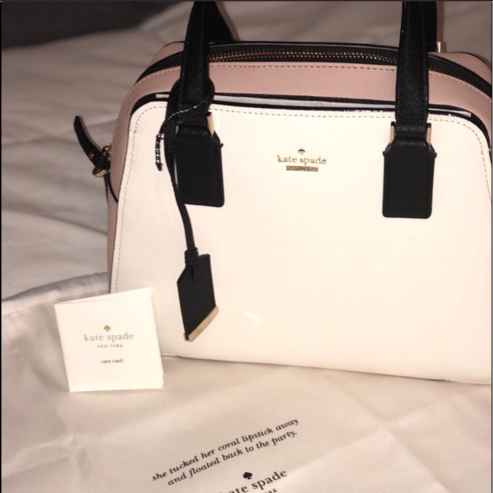 Brand new beautiful Kate Spade purse.